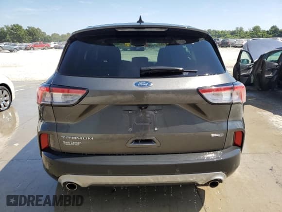 ✅ 2020 Ford Escape Titanium Hybrid • VIN: 1FMCU9DZ9LUC05811 • Лот: 70927045. Опубликован ранее на Copart с пробегом 54 185 миль. Бесплатный доступ к архиву аукционных продаж из США и подробный отчёт об истории автомобиля на DreamBid. Изображение 6.