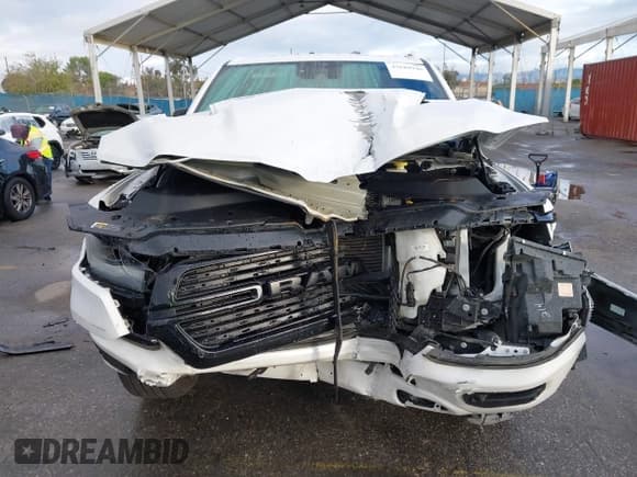 ✅ 2022 Ram 1500 Laramie • VIN: 1C6RREJM5NN276798 • Lot: 43688940. Listed on IAAI with 64,582 mi. Free auction sales archive from the USA and detailed vehicle history report at DreamBid. Image 12.