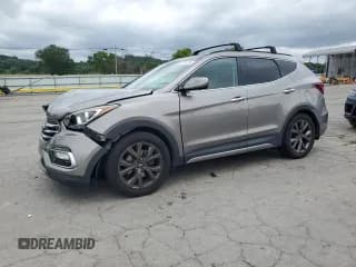 ✅ 2018 Hyundai Santa Fe Ultimate • VIN: 5XYZW4LA0JG553809 • Лот: 67670235. Опубликован ранее на Copart с пробегом 59 562 миль. Бесплатный доступ к архиву аукционных продаж из США и подробный отчёт об истории автомобиля на DreamBid. Изображение 1.