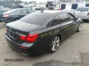 ✅ 2013 BMW 7 Series 750Li xDrive • VIN: WBAYF8C51DD140657 • Lot: 32751348. Listed on IAAI with 128,816 mi. Free auction sales archive from the USA and detailed vehicle history report at DreamBid. Image 4.