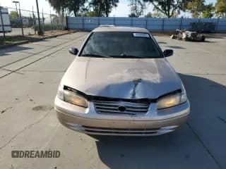 ✅ 1999 Toyota Camry LE • VIN: JT2BF22K7X0220451 • Lot: 86086885. Listed on Copart with 184,999 mi. Free auction sales archive from the USA and detailed vehicle history report at DreamBid. Image 5.