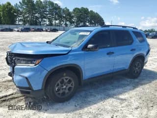 ✅ 2024 Honda Pilot TrailSport • VIN: 5FNYG1H65RB023902 • Лот: 61254595. Опубликован ранее на Copart с пробегом 21 873 миль. Бесплатный доступ к архиву аукционных продаж из США и подробный отчёт об истории автомобиля на DreamBid. Изображение 1.