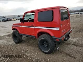 ✅ 1986 Suzuki Samurai Deluxe • VIN: JS3JC51V4G4101985 • Lot: 87197554. Wystawiony na Copart z przebiegiem Nie podano. Bezpłatny archiwum sprzedaży aukcyjnych z USA i szczegółowy raport historii pojazdu na DreamBid. Zdjęcie 2.