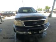 ✅ 1998 Ford Expedition XLT • VIN: 1FMRU1768WLB79158 • Lot: 66846805. Listed on Copart with 302,338 mi. Free auction sales archive from the USA and detailed vehicle history report at DreamBid. Image 14.