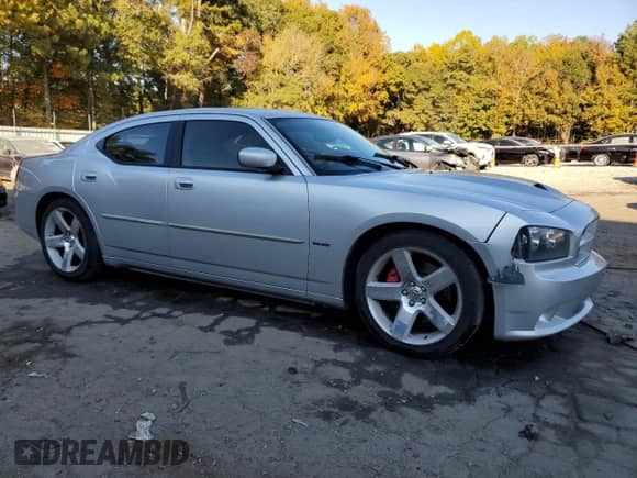 2007 Dodge Charger SRT-8 с VIN 2B3LA73W17H787535, выставлен на аукционе Copart как лот 78386124 с пробегом 173 263 миль миль и Списание • Salvage title. История ставок и продаж доступна на DreamBid. Изображение 4.