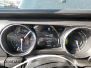 ✅ 2022 Jeep Wrangler Unlimited Sahara High Altitude • VIN: 1C4JJXP63NW239633 • Lot: 48973285. Listed on Copart with 21,906 mi. Free auction sales archive from the USA and detailed vehicle history report at DreamBid. Image 9.