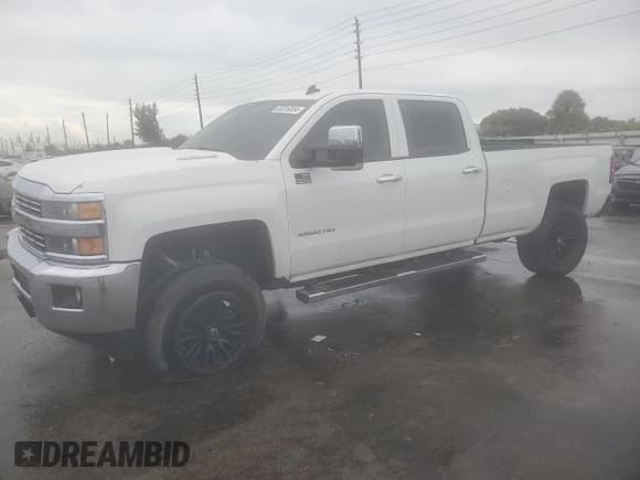 ✅ 2015 Chevrolet Silverado 2500HD LT • VIN: 1GC1CVE81FF100234 • Lot: 69316554. Listed on Copart with 195,795 mi. Free auction sales archive from the USA and detailed vehicle history report at DreamBid. Image 1.
