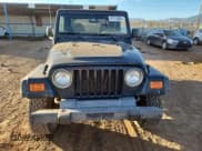 ✅ 2000 Jeep Wrangler Sport • VIN: 1J4FA49S9YP738234 • Lot: 91114555. Listed on Copart with 245,066 mi. Free auction sales archive from the USA and detailed vehicle history report at DreamBid. Image 5.