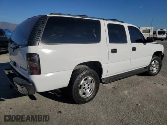 2003 Chevrolet Suburban LS с VIN 1GNEC16T73J263581, выставлен на аукционе Copart как лот 80324514 с пробегом 241 672 миль миль и Списание • Salvage title. История ставок и продаж доступна на DreamBid. Изображение 3.