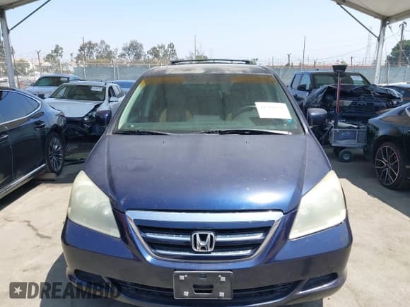 ✅ 2005 Honda Odyssey EX-L • VIN: 5FNRL38755B014776 • Lot: 42598139. Listed on IAAI with 188,522 mi. Free auction sales archive from the USA and detailed vehicle history report at DreamBid. Image 6.