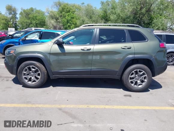 ✅ 2021 Jeep Cherokee Trailhawk • VIN: 1C4PJMBX9MD142777 • Lot: 42363454. Listed on IAAI with 47,004 mi. Free auction sales archive from the USA and detailed vehicle history report at DreamBid. Image 14.