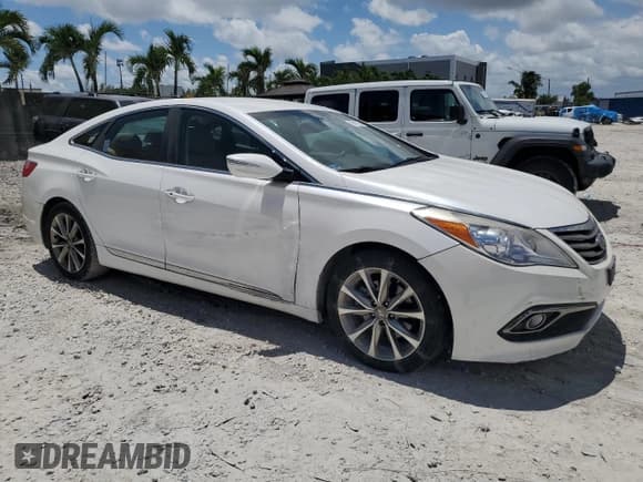 ✅ 2015 Hyundai Azera • VIN: KMHFG4JGXFA468082 • Lot: 69019715. Listed on Copart with 127,984 mi. Free auction sales archive from the USA and detailed vehicle history report at DreamBid. Image 4.