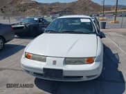 ✅ 2002 Saturn SL • VIN: 1G8ZH52802Z154555 • Lot: 42771346. Listed on IAAI with 248,496 mi. Free auction sales archive from the USA and detailed vehicle history report at DreamBid. Image 12.