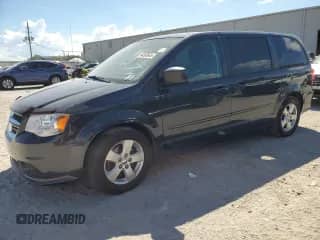 2013 Dodge Grand Caravan American Value with VIN 2C4RDGBG5DR733042, listed as a Copart auction lot 84203645 with 138,360 mi miles and Clean title. Bid and sale history available at DreamBid. Image 1.