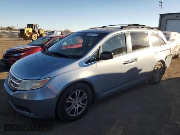 ✅ 2012 Honda Odyssey EX-L • VIN: 5FNRL5H62CB110218 • Lot: 93038295. Listed on Copart with 195,003 mi. Free auction sales archive from the USA and detailed vehicle history report at DreamBid. Image 1.