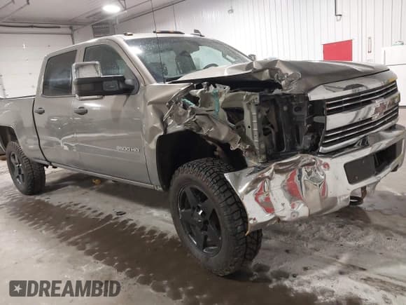 ✅ 2017 Chevrolet Silverado 2500HD Work Truck • VIN: 1GC1KUEG0HF128856 • Lot: 42046701. Listed on IAAI with 200,705 mi. Free auction sales archive from the USA and detailed vehicle history report at DreamBid. Image 1.