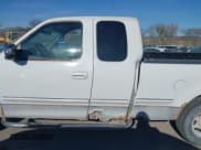 ✅ 1998 Ford F-150 • VIN: 2FTZX1760WCA98189 • Lot: 43675999. Listed on IAAI with 170,108 mi. Free auction sales archive from the USA and detailed vehicle history report at DreamBid. Image 14.