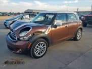✅ 2015 MINI Countryman • VIN: WMWZB3C59FWR43405 • Lot: 82287575. Listed on Copart with 47,322 mi. Free auction sales archive from the USA and detailed vehicle history report at DreamBid. Image 1.