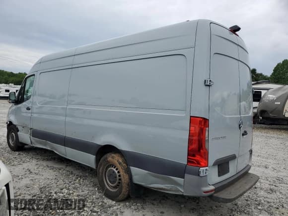 ✅ 2021 Mercedes-Benz Sprinter Cargo • VIN: W1Y4ECHY4MT067554 • Лот: 57554735. Опубликован ранее на Copart с пробегом 183 576 миль. Бесплатный доступ к архиву аукционных продаж из США и подробный отчёт об истории автомобиля на DreamBid. Изображение 2.