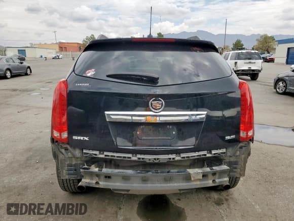 ✅ 2015 Cadillac SRX • VIN: 3GYFNAE37FS509115 • Лот: 85842335. Опубликован ранее на Copart с пробегом 83 192 миль. Бесплатный доступ к архиву аукционных продаж из США и подробный отчёт об истории автомобиля на DreamBid. Изображение 6.