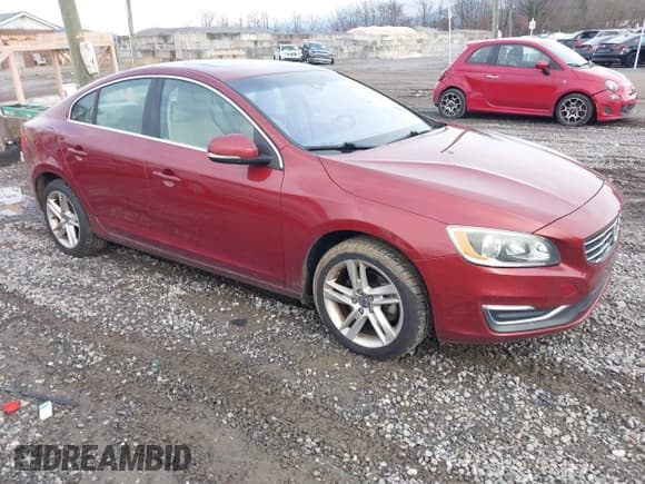 ✅ 2015 Volvo S60 T5 Drive-E Premier • VIN: YV126MFB7F1314474 • Lot: 43906106. Listed on IAAI with 124,588 mi. Free auction sales archive from the USA and detailed vehicle history report at DreamBid. Image 1.