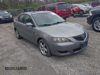 ✅ 2006 Mazda 3 i • VIN: JM1BK12F961465857 • Lot: 43696357. Listed on IAAI with 236,659 mi. Free auction sales archive from the USA and detailed vehicle history report at DreamBid. Image 1.