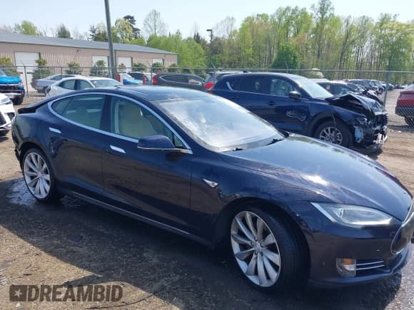 ✅ 2013 Tesla Model S • VIN: 5YJSA1CN5DFP20579 • Lot: 41983339. Listed on IAAI with 80,118 mi. Free auction sales archive from the USA and detailed vehicle history report at DreamBid. Image 1.