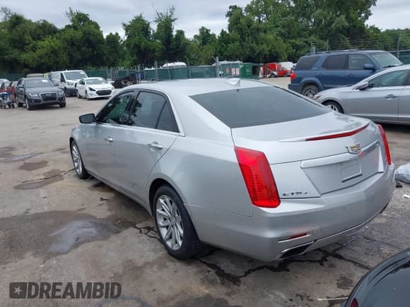 ✅ 2015 Cadillac CTS AWD • VIN: 1G6AW5SX3F0142431 • Lot: 43027413. Listed on IAAI with 125,276 mi. Free auction sales archive from the USA and detailed vehicle history report at DreamBid. Image 3.