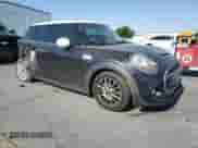 2014 MINI Hardtop S with VIN WMWXM7C59ET987820, listed as a Copart auction lot 59164955 with 77,699 mi miles and Salvage title. Bid and sale history available at DreamBid. Image 4.