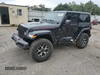 ✅ 2020 Jeep Wrangler Rubicon • VIN: 1C4HJXCG4LW175807 • Lot: 79909184. Listed on Copart with 56,935 mi. Free auction sales archive from the USA and detailed vehicle history report at DreamBid. Image 1.