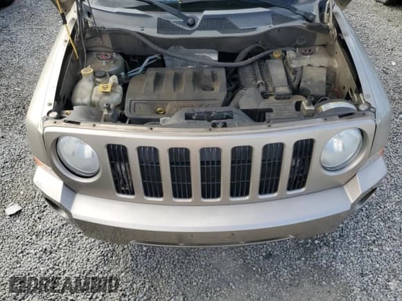 ✅ 2010 Jeep Patriot Sport • VIN: 1J4NT2GB2AD558274 • Lot: 89495985. Listed on Copart with 102,408 mi. Free auction sales archive from the USA and detailed vehicle history report at DreamBid. Image 11.