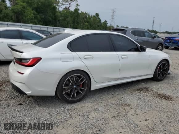 2021 BMW 3 Series M340i with VIN WBA5U7C0XMFL41484, listed as a Copart auction lot 54053495 with 36,823 mi miles and Salvage title. Bid and sale history available at DreamBid. Image 3.
