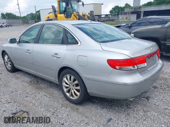 2007 Hyundai Azera SE с VIN KMHFC46F97A215820, выставлен на аукционе IAAI как лот 42120029 с пробегом 211 069 миль миль и . История ставок и продаж доступна на DreamBid. Изображение 3.