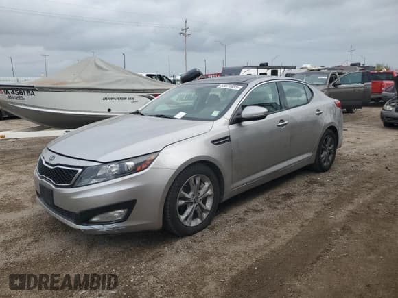 ✅ 2011 Kia Optima EX • VIN: KNAGN4A60B5145939 • Lot: 83871655. Listed on Copart with 166,096 mi. Free auction sales archive from the USA and detailed vehicle history report at DreamBid. Image 1.