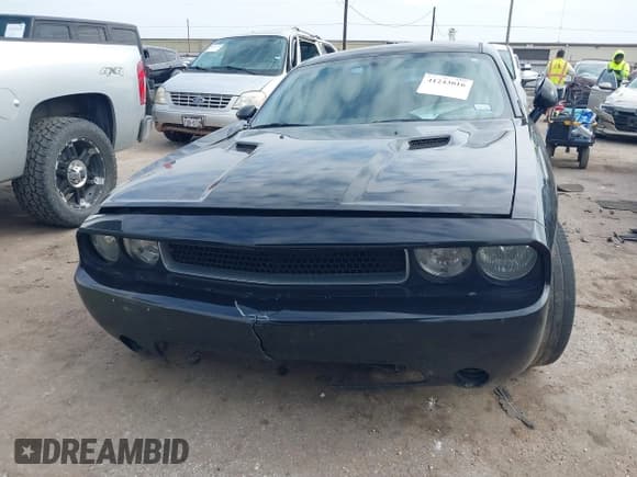 ✅ 2013 Dodge Challenger SXT • VIN: 2C3CDYAG5DH500642 • Lot: 41243016. Wystawiony na IAAI z przebiegiem 199 136 mil. Bezpłatny archiwum sprzedaży aukcyjnych z USA i szczegółowy raport historii pojazdu na DreamBid. Zdjęcie 12.