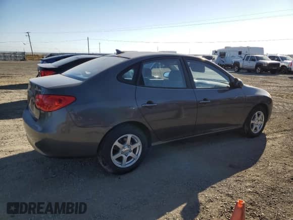 2009 Hyundai Elantra GLS z VIN KMHDU46D79U722672, wystawiony jako Copart lot #71370544 z przebiegiem 145 386 mil mil oraz Szkoda całkowita • Salvage title. Historia ofert i sprzedaży dostępna na DreamBid. Obrazek 3.