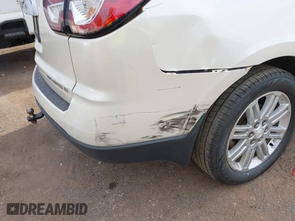 ✅ 2014 Chevrolet Traverse LT • VIN: 1GNKVGKD6EJ165854 • Lot: 42860430. Wystawiony na IAAI z przebiegiem 185 264 mil. Bezpłatny archiwum sprzedaży aukcyjnych z USA i szczegółowy raport historii pojazdu na DreamBid. Zdjęcie 18.