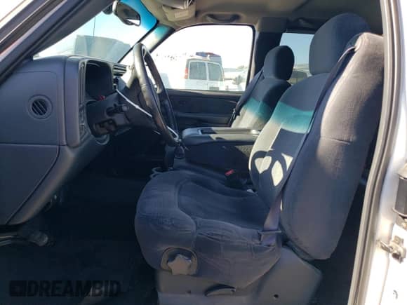 2002 Chevrolet Silverado 1500 with VIN 1GCEC19T02E150146, listed as a Copart auction lot 77425664 with 295,228 mi miles and Salvage title. Bid and sale history available at DreamBid. Image 7.