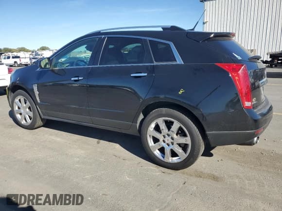 ✅ 2012 Cadillac SRX Performance Collection • VIN: 3GYFNEE37CS645859 • Lot: 87452835. Listed on Copart with 135,893 mi. Free auction sales archive from the USA and detailed vehicle history report at DreamBid. Image 2.