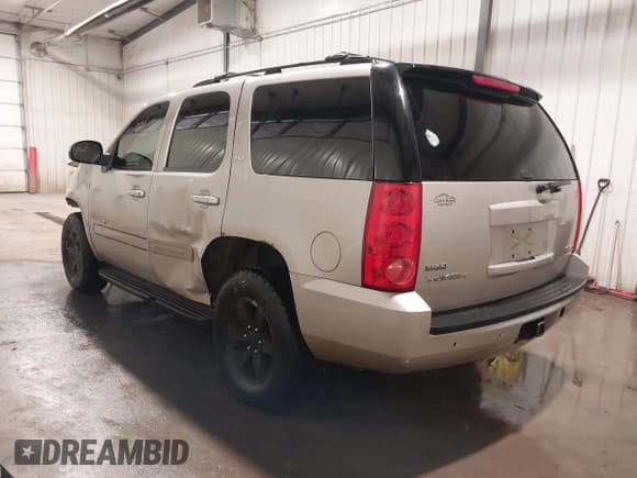 ✅ 2009 GMC Yukon SLT 4SB • VIN: 1GKFK33059R247089 • Lot: 41995681. Listed on IAAI with 209,824 mi. Free auction sales archive from the USA and detailed vehicle history report at DreamBid. Image 3.