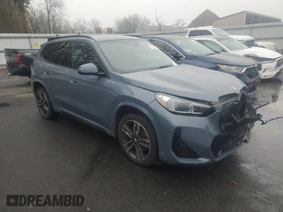 ✅ 2024 BMW X1 xDrive28i • VIN: WBX73EF07R5Y79901 • Лот: 91943095. Опубликован ранее на Copart с пробегом 26 800 миль. Бесплатный доступ к архиву аукционных продаж из США и подробный отчёт об истории автомобиля на DreamBid. Изображение 4.