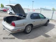 ✅ 1997 Chrysler LHS • VIN: 2C3HC56F9VH782972 • Lot: 42035696. Listed on IAAI with 120,301 mi. Free auction sales archive from the USA and detailed vehicle history report at DreamBid. Image 4.