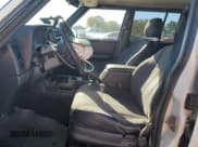 ✅ 1999 Jeep Cherokee Sport • VIN: 1J4FT68S8XL536398 • Lot: 87068025. Listed on Copart with Not provided. Free auction sales archive from the USA and detailed vehicle history report at DreamBid. Image 7.