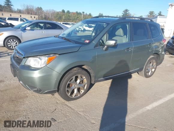 ✅ 2015 Subaru Forester Touring • VIN: JF2SJAUC7FH588703 • Lot: 43680535. Listed on IAAI with 234,995 mi. Free auction sales archive from the USA and detailed vehicle history report at DreamBid. Image 17.