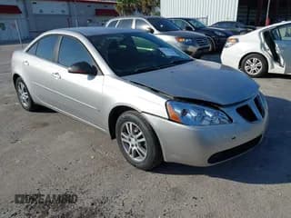 ✅ 2006 Pontiac G6 1SV • VIN: 1G2ZF55B164187364 • Lot: 43781393. Listed on IAAI with 87,882 mi. Free auction sales archive from the USA and detailed vehicle history report at DreamBid. Image 1.