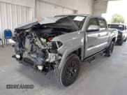 ✅ 2021 Toyota Tacoma SR5 • VIN: 5TFAZ5CN9MX115532 • Lot: 43208018. Listed on IAAI with 25,144 mi. Free auction sales archive from the USA and detailed vehicle history report at DreamBid. Image 2.