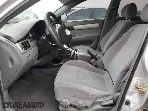 ✅ 2006 Suzuki Forenza • VIN: KL5JD56Z76K411376 • Lot: 82751694. Listed on Copart with Not provided. Free auction sales archive from the USA and detailed vehicle history report at DreamBid. Image 7.