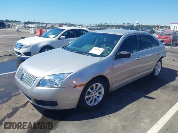 ✅ 2007 Mercury Milan • VIN: 3MEHM01167R632055 • Lot: 43094366. Listed on IAAI with 146,517 mi. Free auction sales archive from the USA and detailed vehicle history report at DreamBid. Image 2.