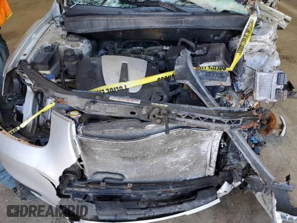 2011 Hyundai Santa Fe SE z VIN 5XYZHDAGXBG050811, wystawiony jako Copart lot #64785325 z przebiegiem Nie podano mil oraz Szkoda całkowita • Salvage title. Historia ofert i sprzedaży dostępna na DreamBid. Obrazek 12.