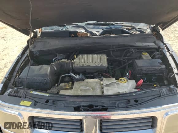 2007 Dodge Nitro SXT with VIN 1D8GT28K87W689785, listed as a Copart auction lot 57440304 with 171,738 mi miles and Salvage title. Bid and sale history available at DreamBid. Image 12.